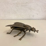 Gold metal ashtray fly