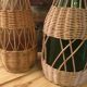 Bouteilles vintage rotin