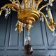 Lustrous pagoda from Maison Baguès in gilded bronze with a decoration of flowers and fruits in glass - 20th century