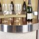 Circular bar in brushed metal, wood and carpet. 1970s.