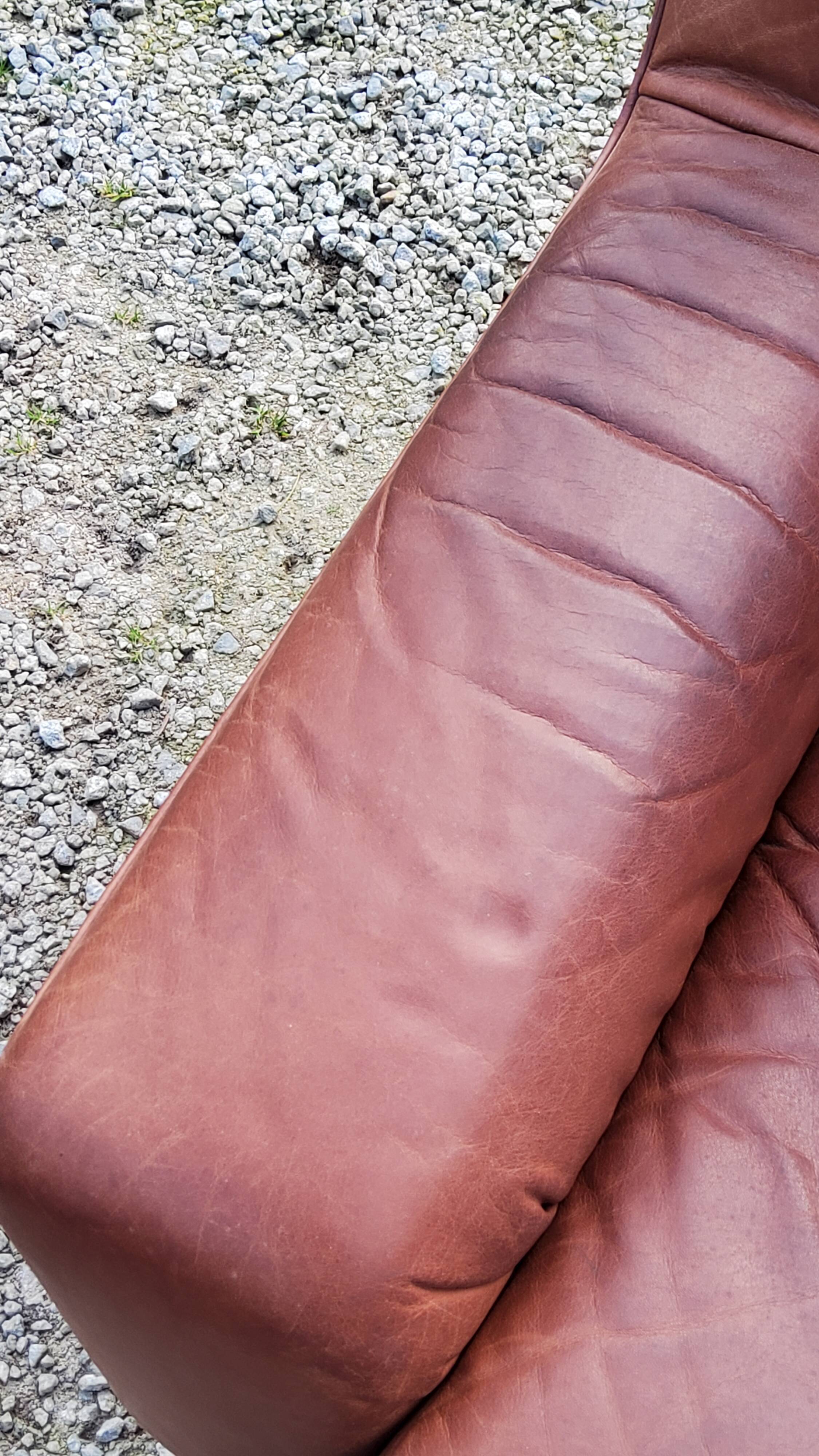 Pair of armchairs and De Sede sofa in cognac leather from the 70s/80s
