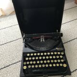 Machine à écrire remington portable en état de marche