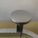 Vintage wall-mounted coat rack in chrome metal with integrated mirror and hat rack