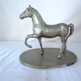 Cheval en laiton sur socle