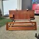 Vintage Scandinavian teak adult bed from the 60s and 70s bedside table.