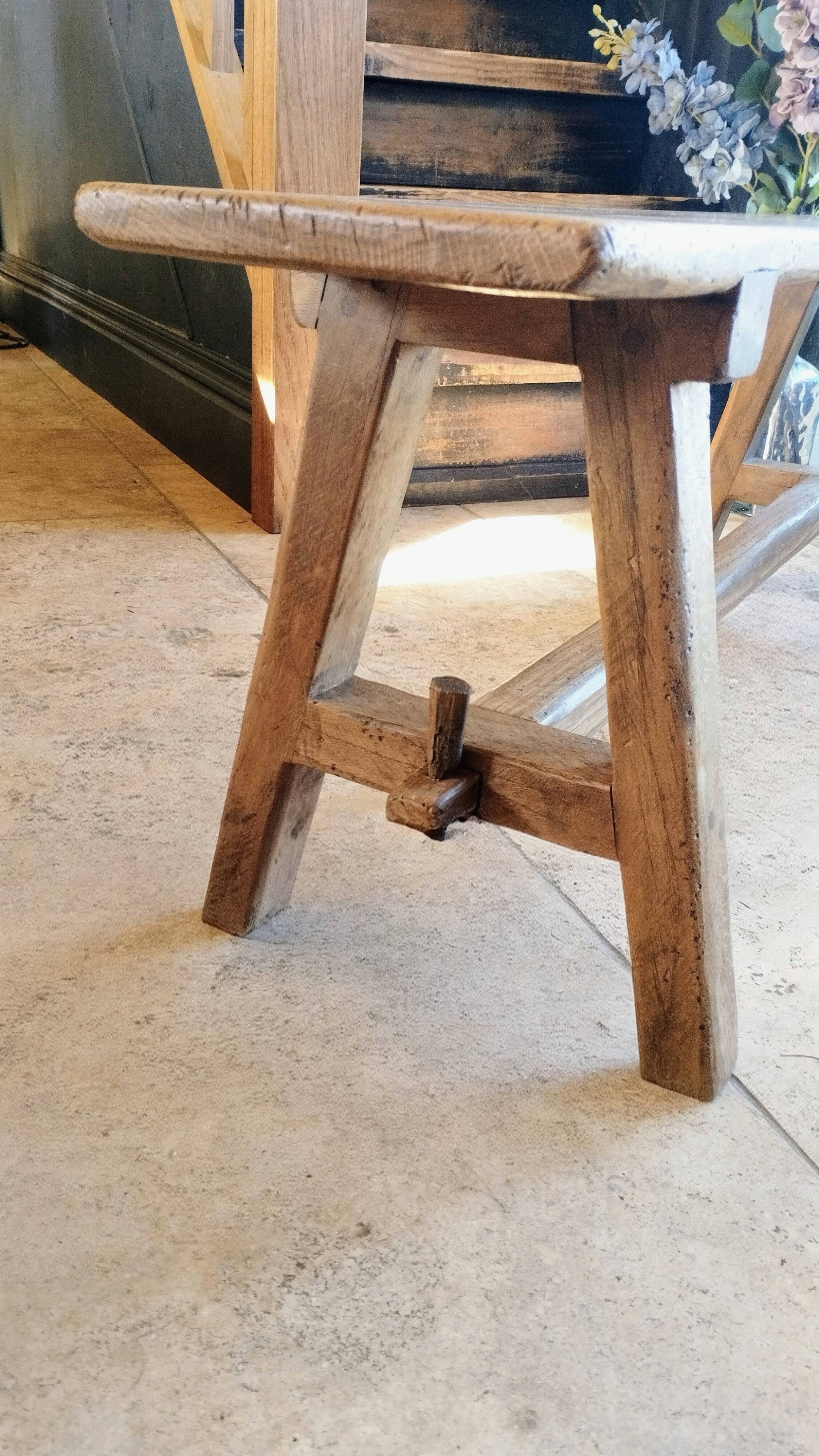 "A frame" bench in solid oak, patinated.