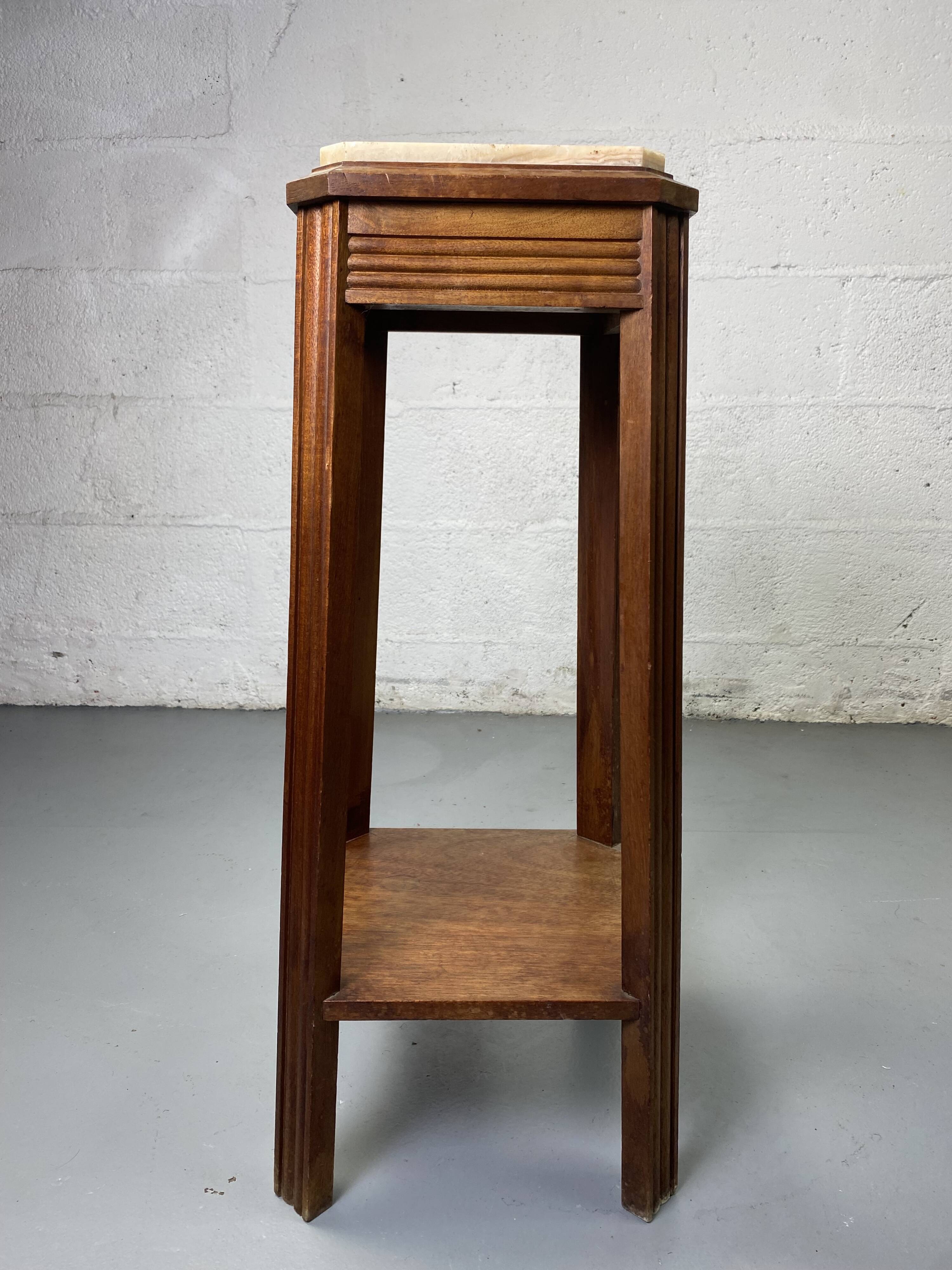 Wooden stool with marble top