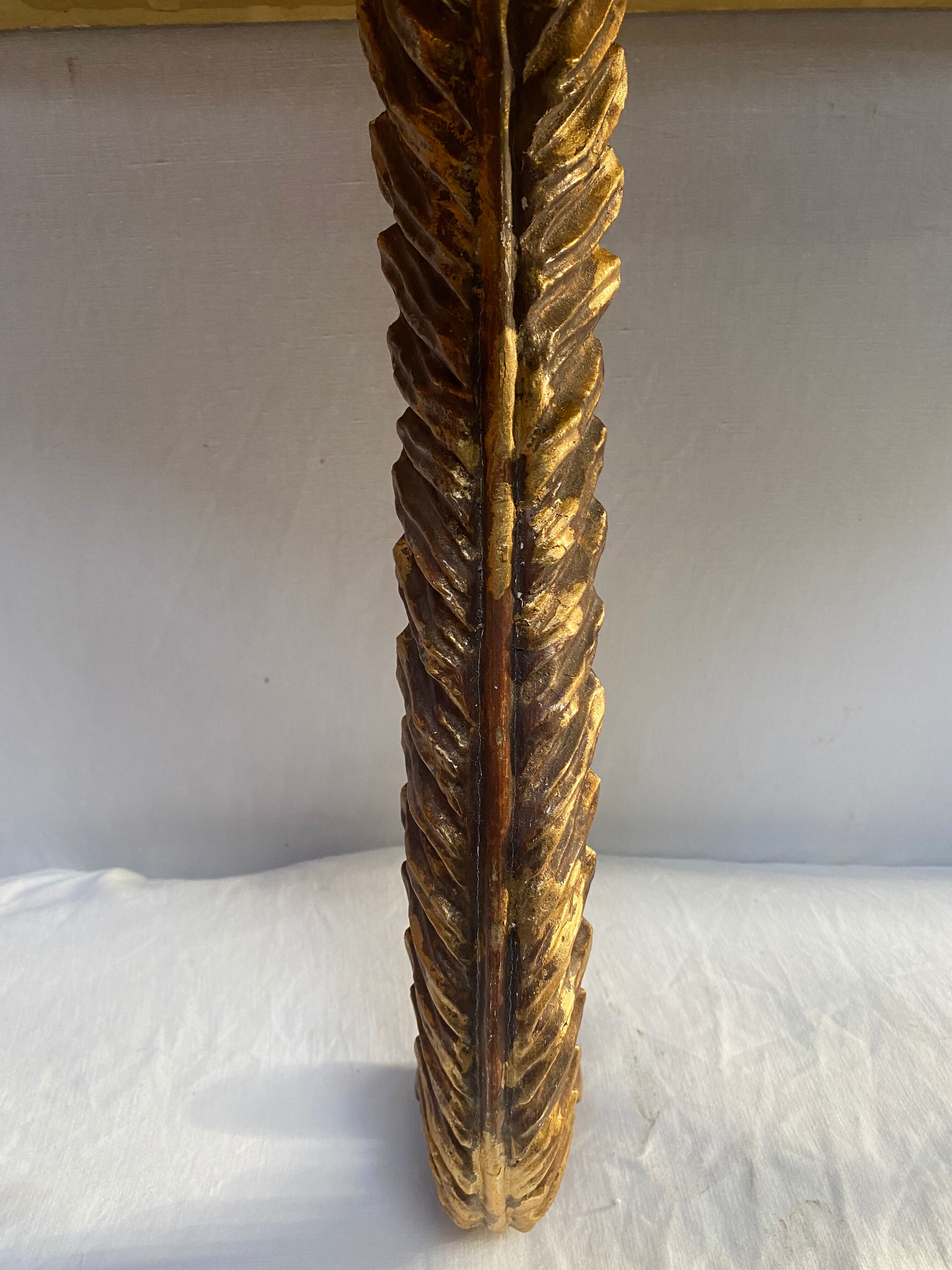 Wooden wall console and antique gilded stucco