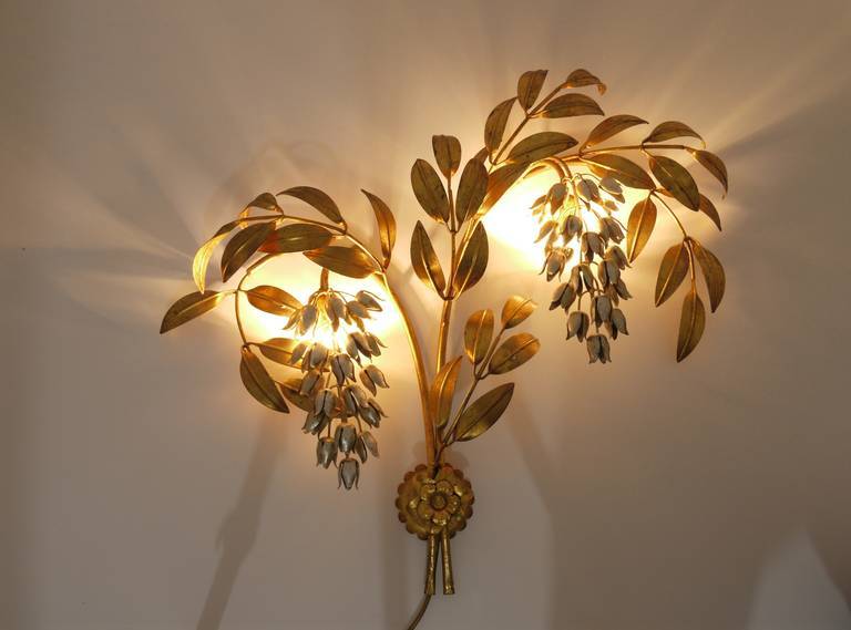 Large gold metal wall lamp in Hollywood Regency style by Hans Kögl, Maison Jansen.