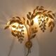 Large gold metal wall lamp in Hollywood Regency style by Hans Kögl, Maison Jansen.