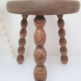 Two vintage tripod solid wood stools