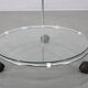 Mid-century round serving table, chrome and glass, Italy, 1980s