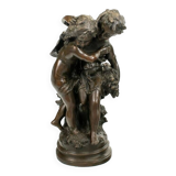 Bronze statue of two children carrying a bouquet of flowers, signed Auguste Moreau (1834-1917)