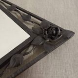 Bevelled wrought iron mirror