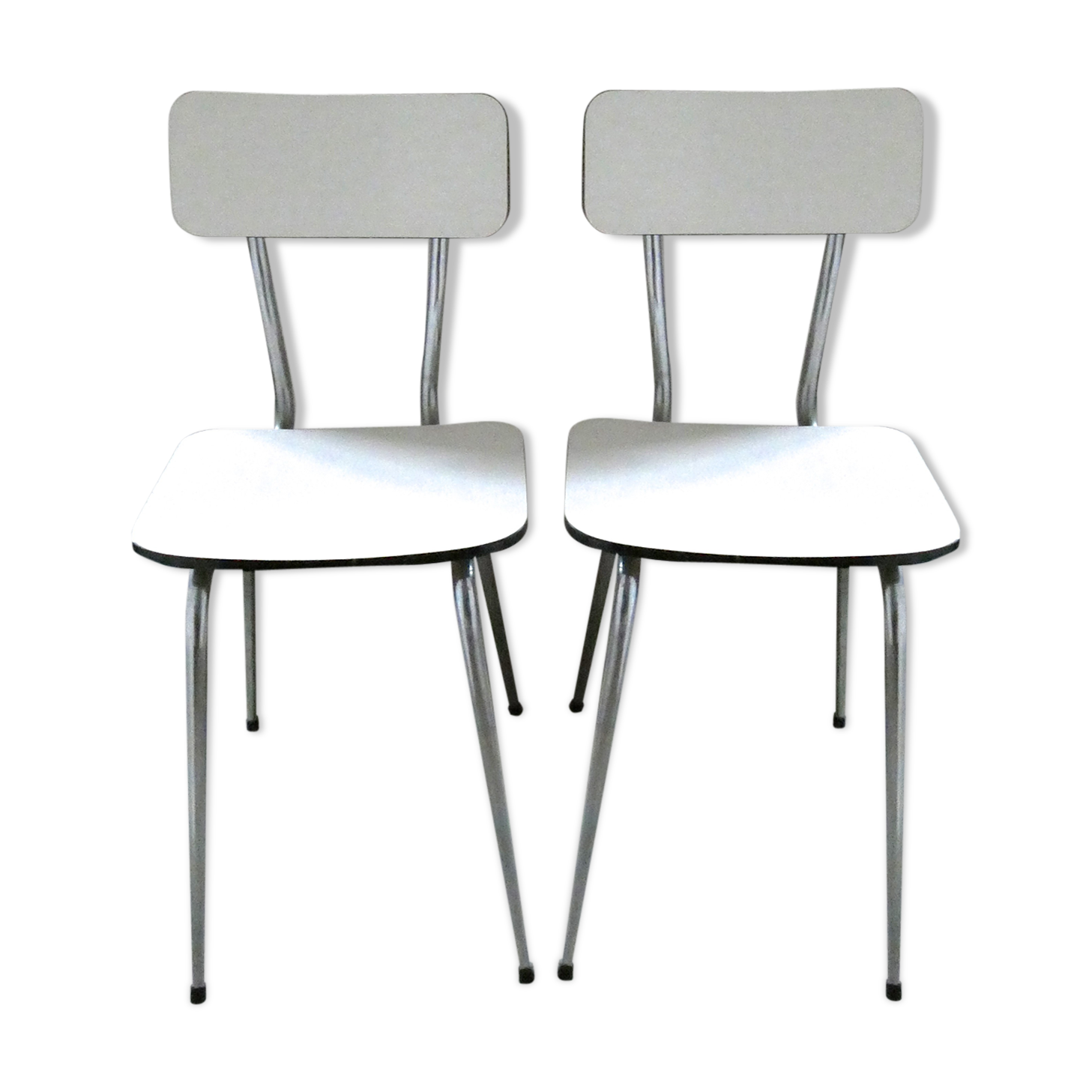 Pair of white formica and slender feet of the 60s Chair