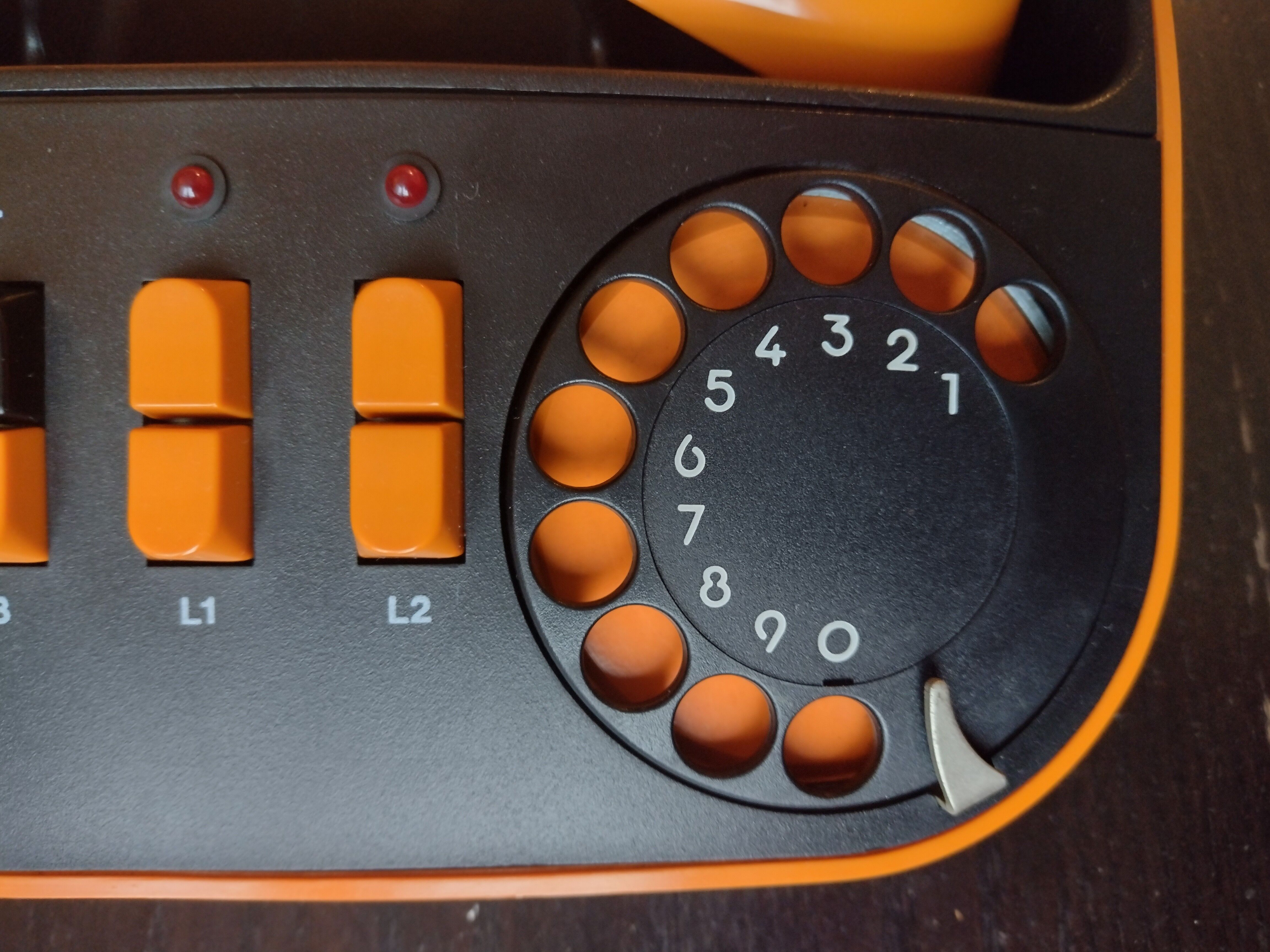 Vintage orange telic phone with ptt dial