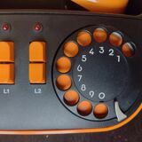 Vintage orange telic phone with ptt dial
