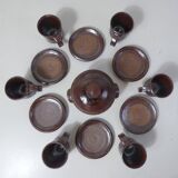 coffee service in iridescent stoneware cups and vintage sugar bowl