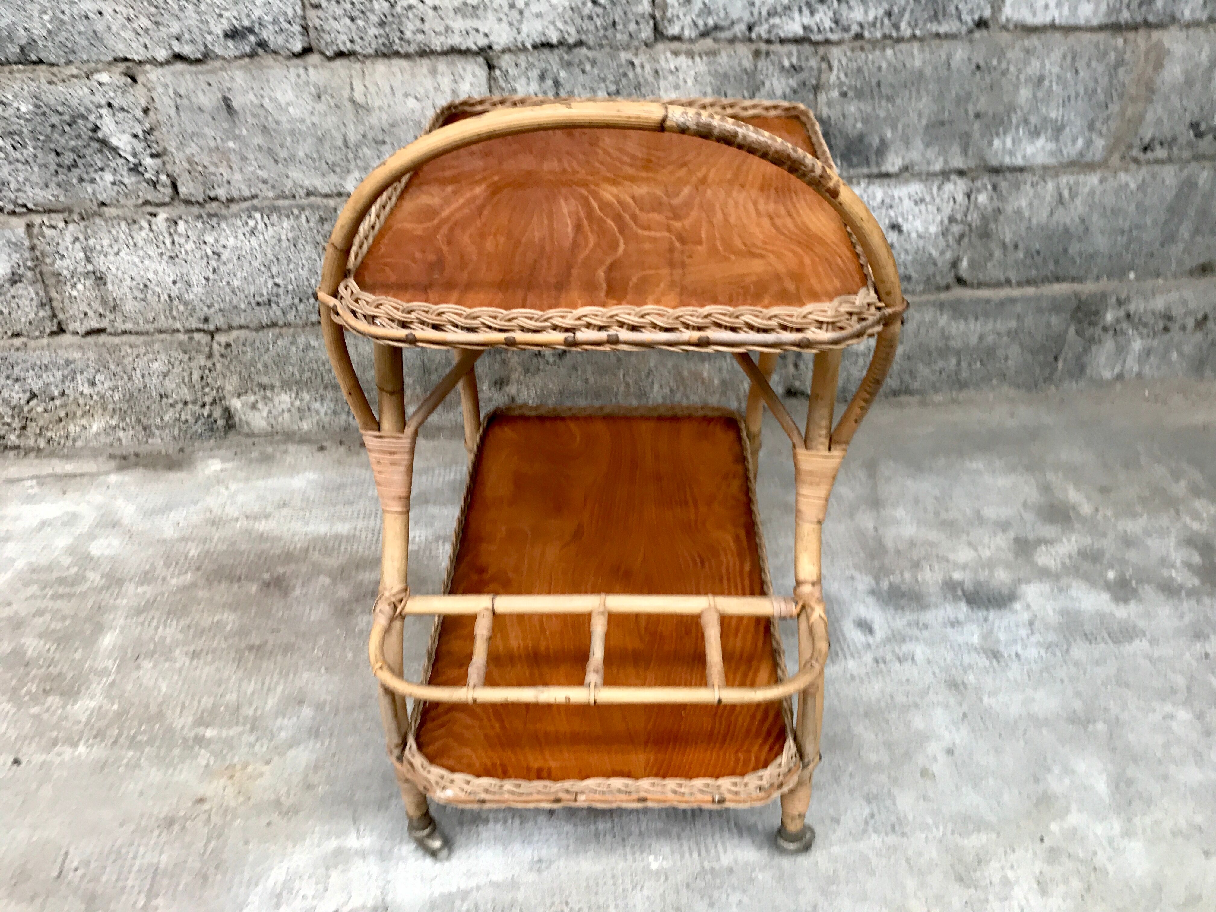 Rolling dessert in woven wicker bamboo rattan with 1950 bottle holder