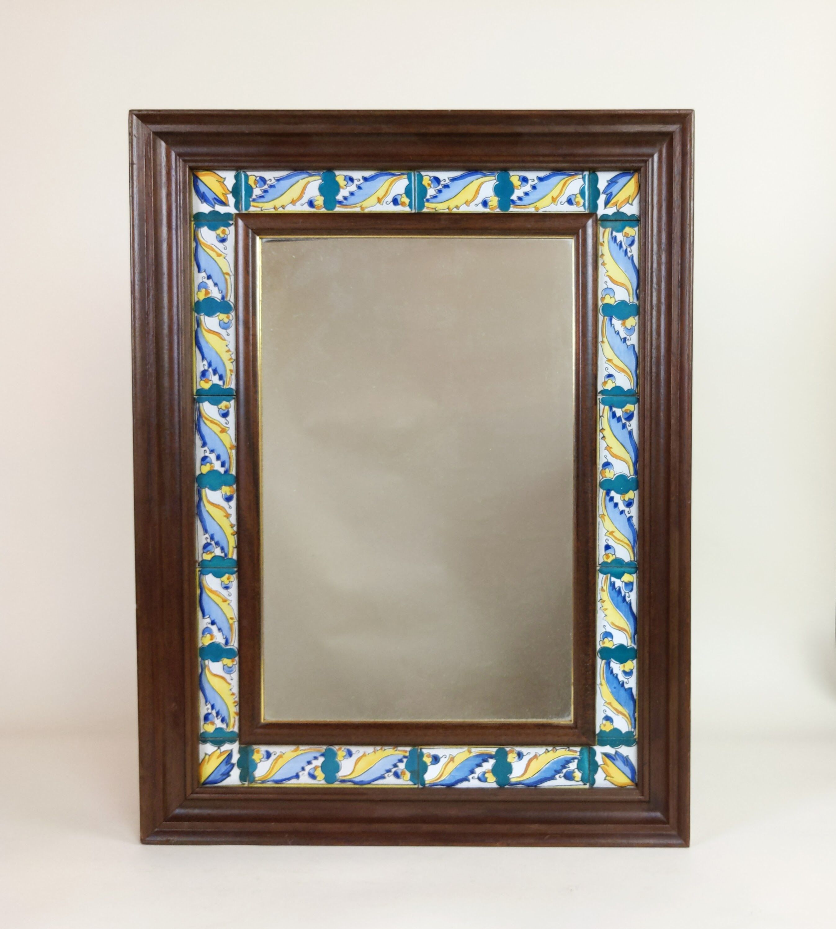 Mirror with wooden frame and painted ceramic tiles