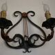 Pair of old antique French double lyre shape green wrought iron wall sconces