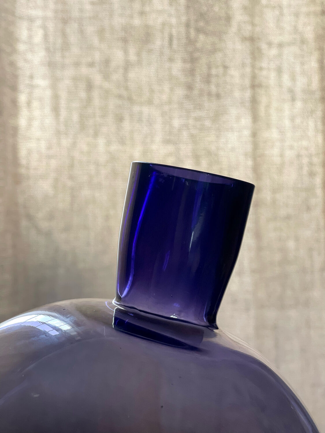 Purple vase inclined