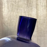 Purple vase inclined