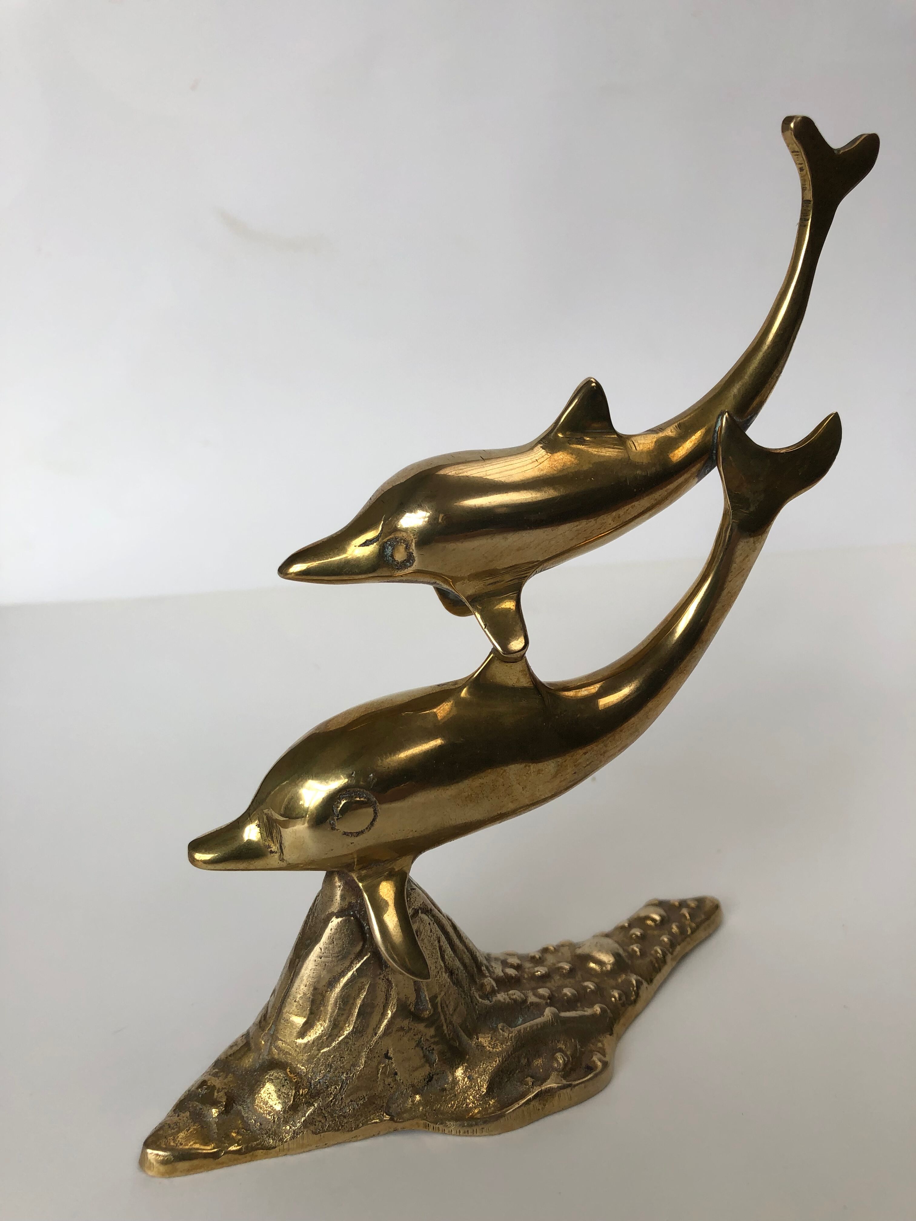 Dauphins en laiton