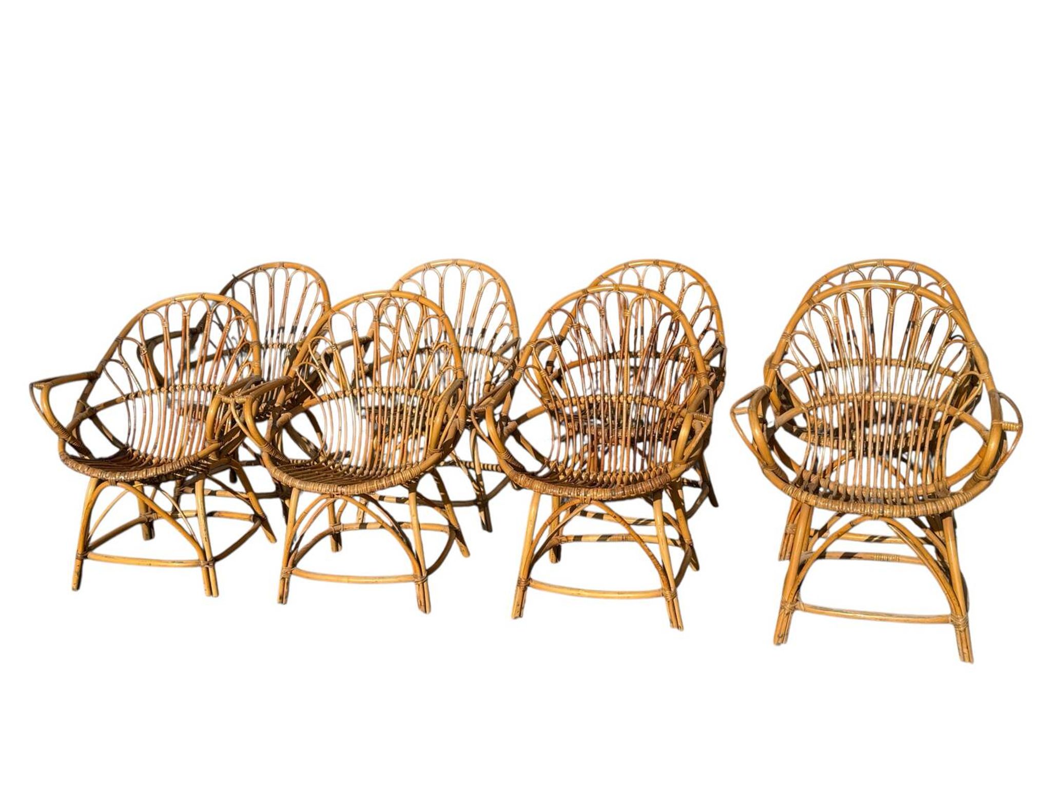 Set of 8 rattan armchairs from the 1960s, France.