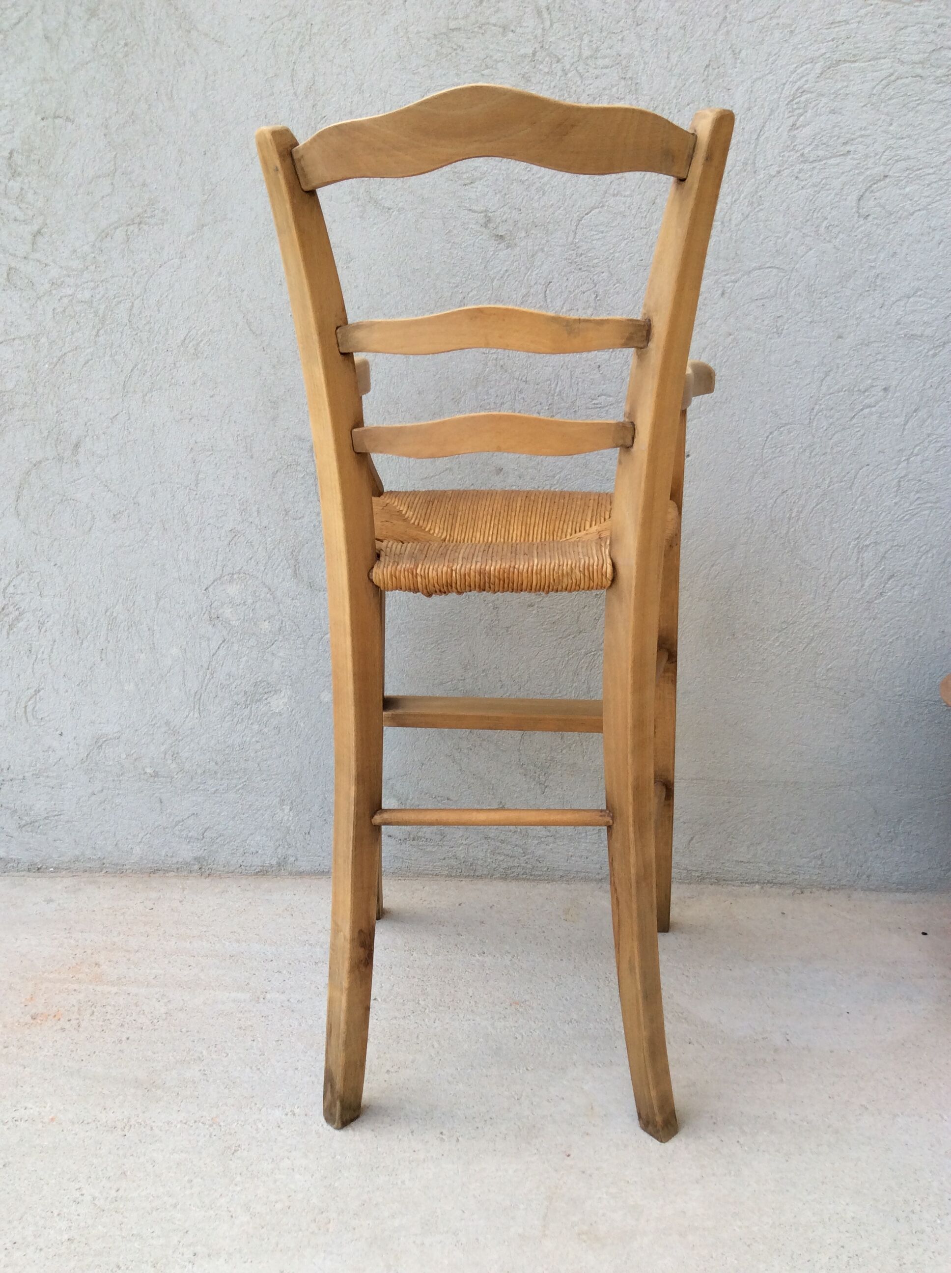 High chair for children in mulched seated wood
