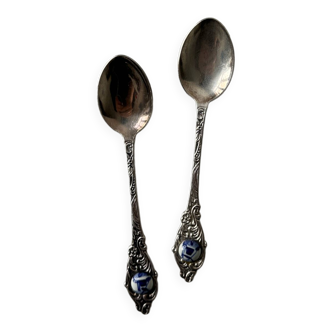 Two small metal and porcelain spoons