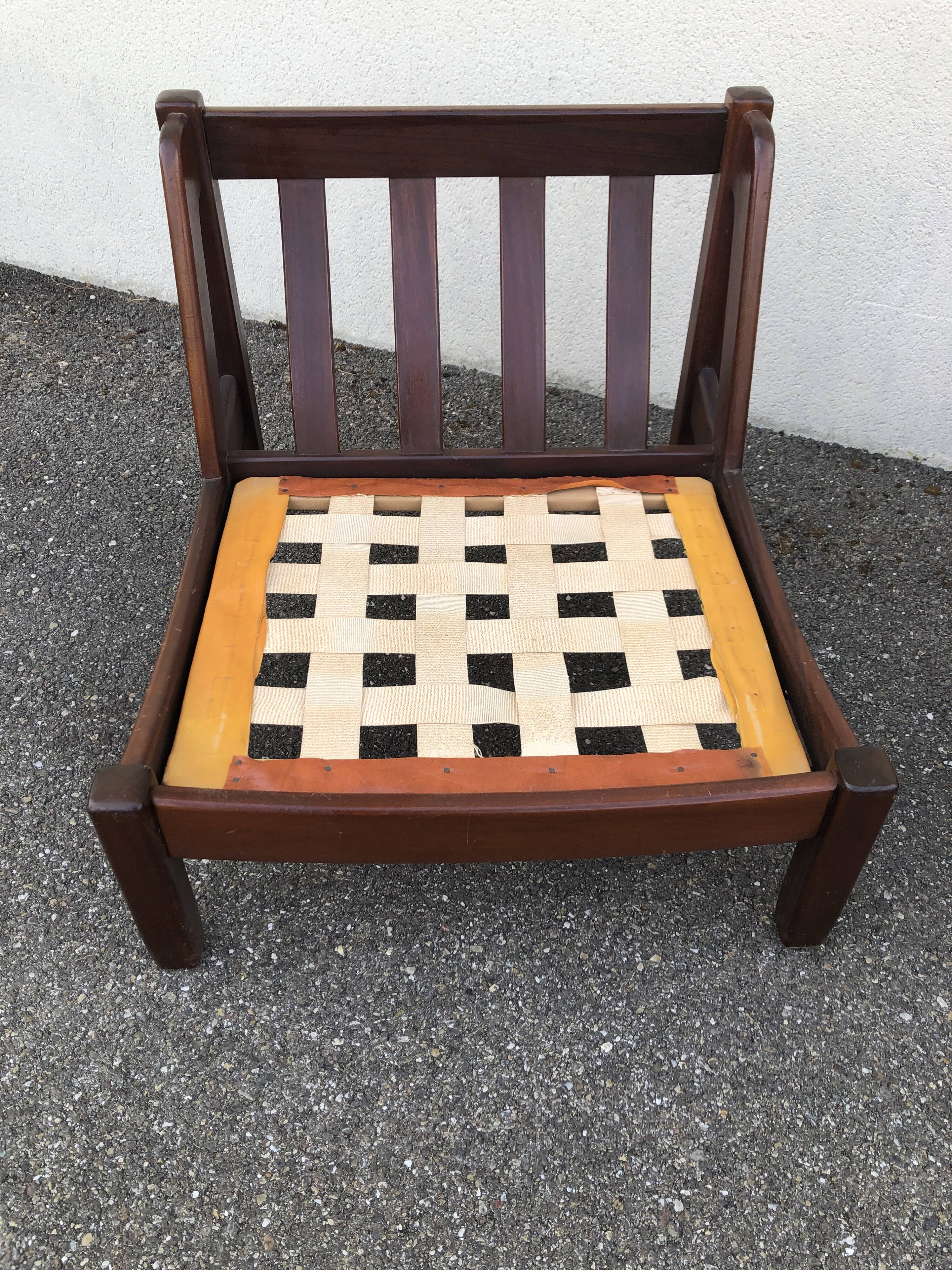 Leather and wood armchairs 70s
