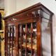 Pair of Empire period mahogany bookcases with flame pattern from the 19th century.