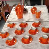 Iridescent orange porcelain coffee set from the 50s-60s with black edging