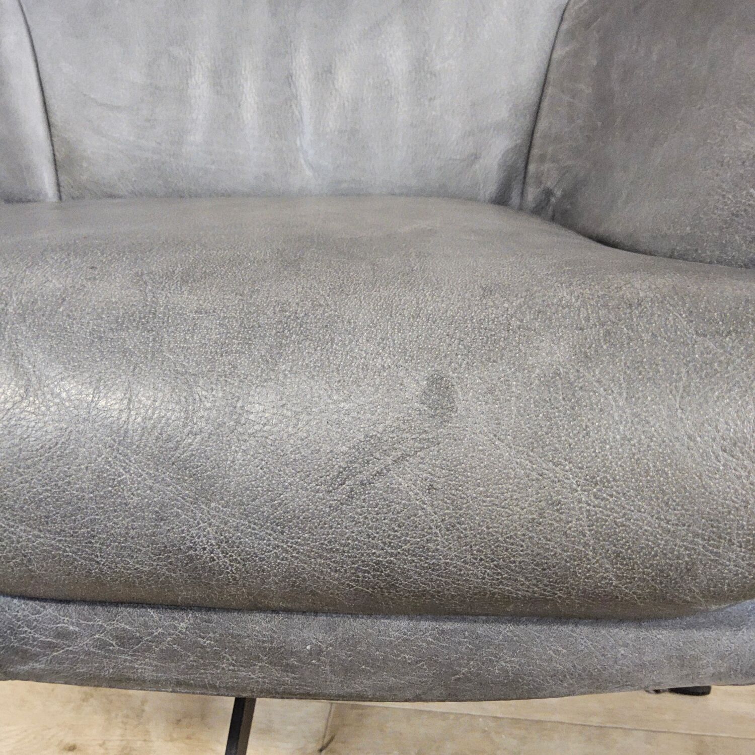 Grey leather swivel armchair Specter by DYYK (Almost new)