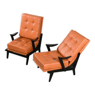 Pair of wooden and leather armchairs, circa 1950