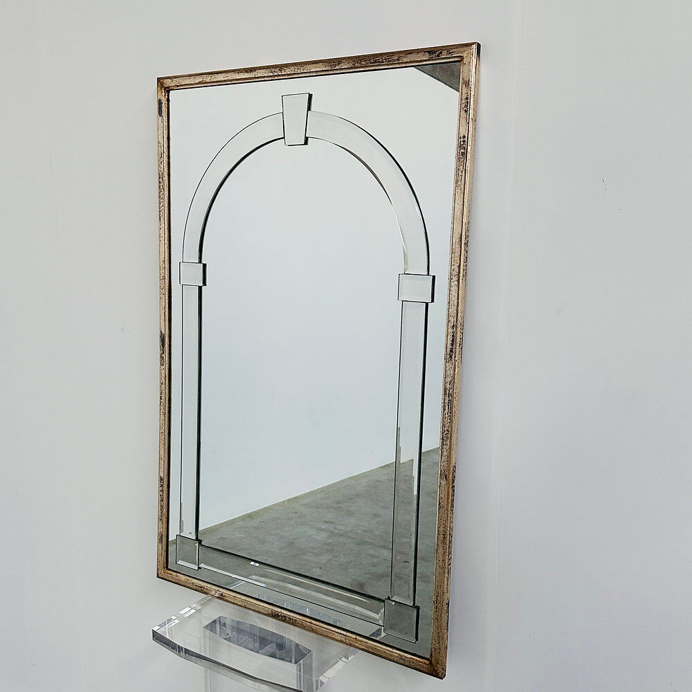 Large Art Deco style beveled wall mirror with architectural arch design