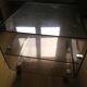 Table de chevet basse plexiglas fumé Michel Dumas pour Roche Bobois roulettes vintage