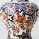 Dutch chinoiserie table lamp in polychrome Delftware, Makkum, with a new coral silk shade