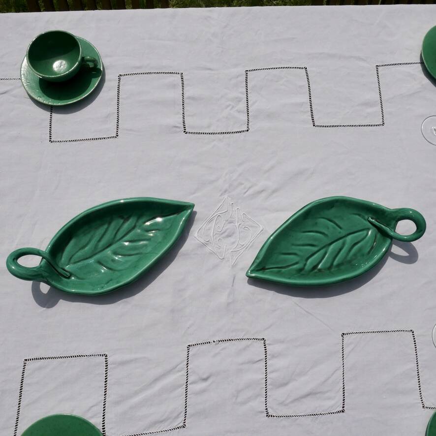 Duo of Vallauris raviers in the shape of green leaves signed Cérenne