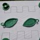 Duo of Vallauris raviers in the shape of green leaves signed Cérenne