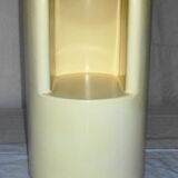 Cylindrical fiberglass bedside table from the 60s