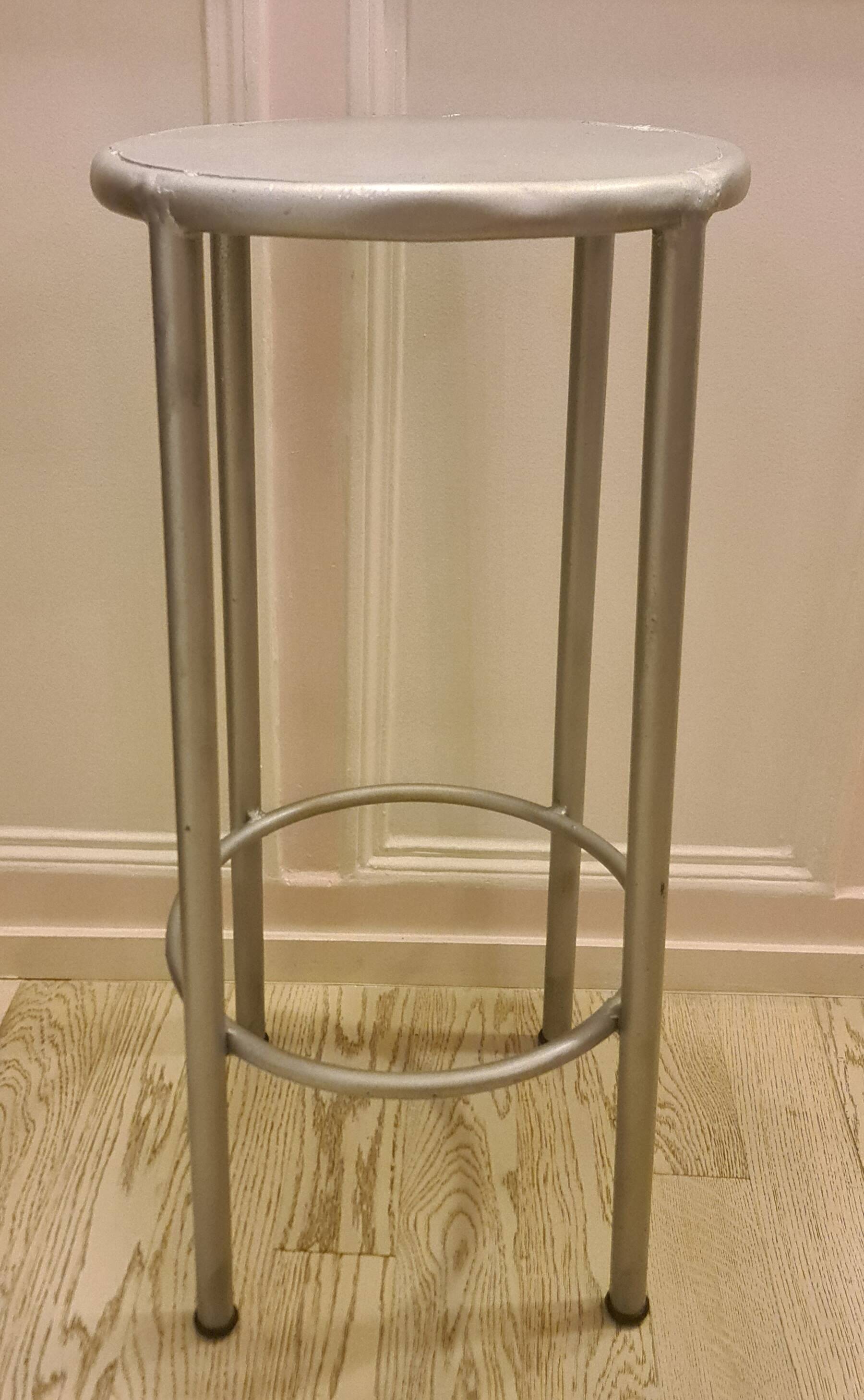 Old industrial iron stool repainted metallic gray in perfect condition