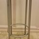 Old industrial iron stool repainted metallic gray in perfect condition