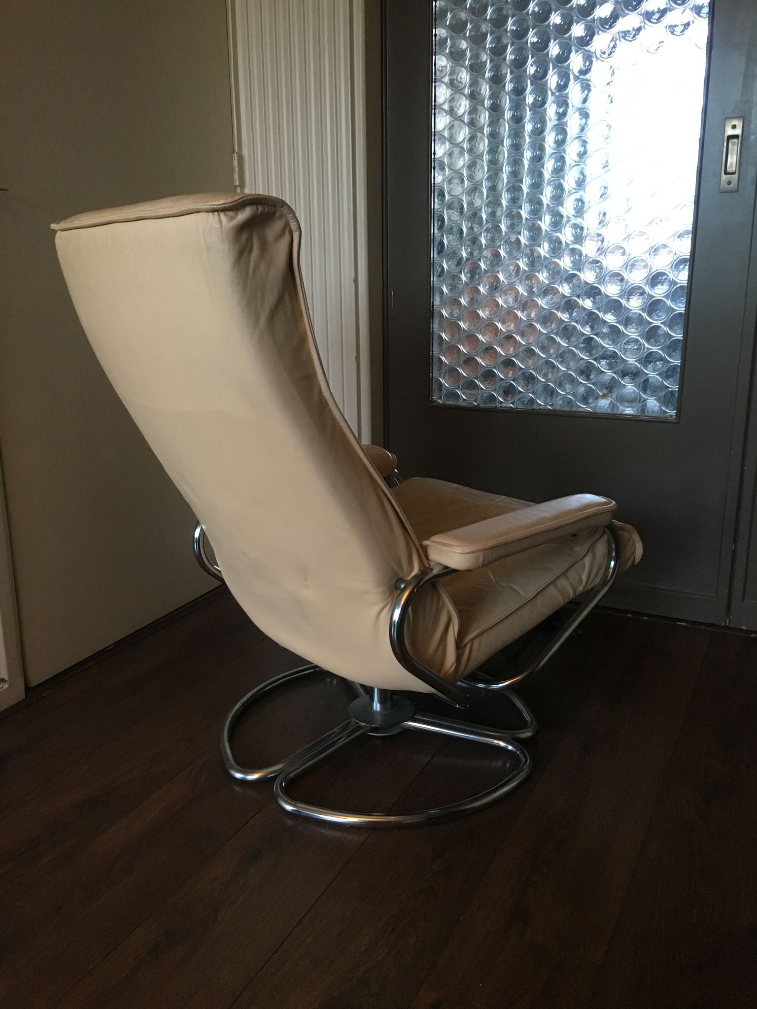 Mid-century danish leather & tubular steel swivel lounge armchair