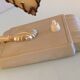 Brass bedside lamp and beige lampshade art deco style