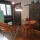 Smoked glass round table and chrome foot
