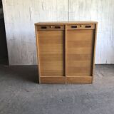 Mid-century industrial haberdashery cabinet in brown oak, double tambour, 1950s.
