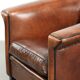 Sleek sheepskin Art Deco design armchair with black piping