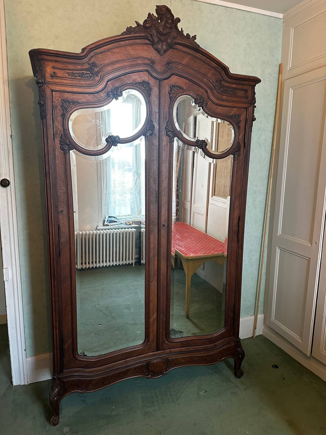Carved walnut wardrobe – late 19th century Louis XV style